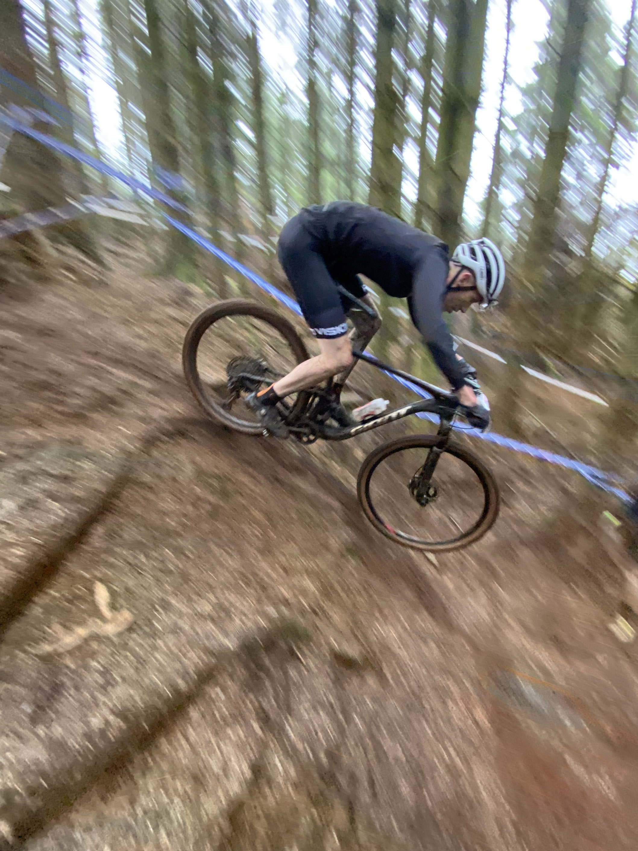Preson going really fast down a steep hill